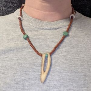Handcrafted Beaded Necklace with Natural Accents